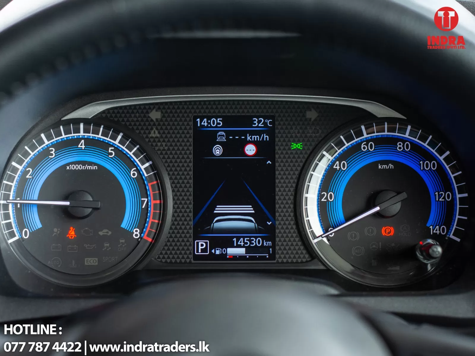 Dashboard cluster with left tachometer and right speedometer, center screen showing time 14:05, temp 32°C, gear in P, and odometer 14,530 km; warning icons visible.